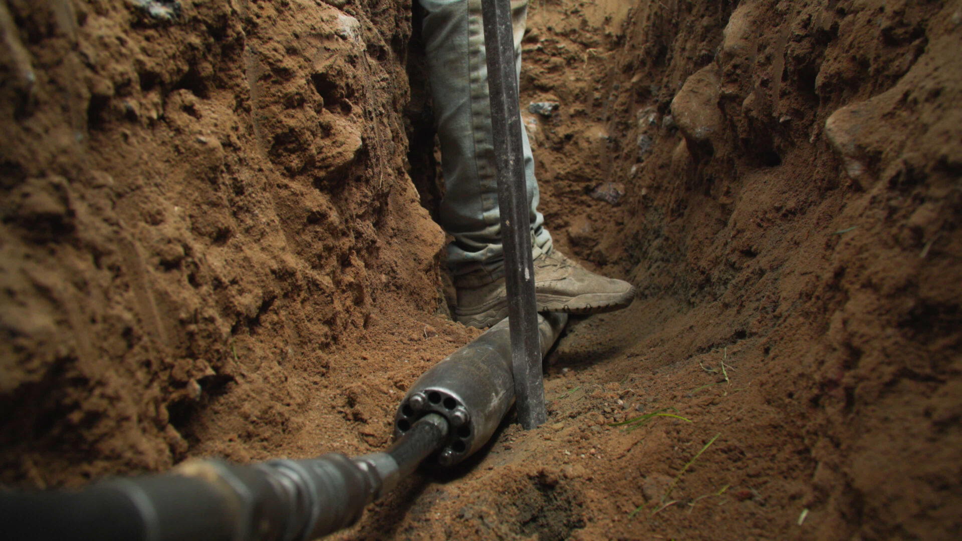 Donahue Plumber working on a sewer line at a home in Salt Lake City Utah