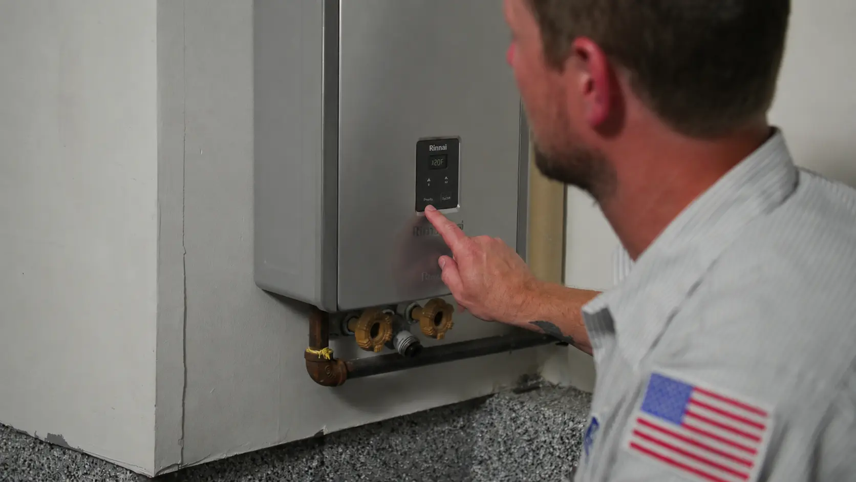 donahue-plumbing-technician-servicing-tankless-water-heater